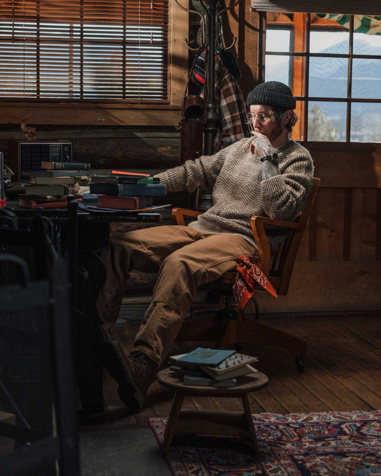 Of The Trees, Tyler Coombs, at desk by window
