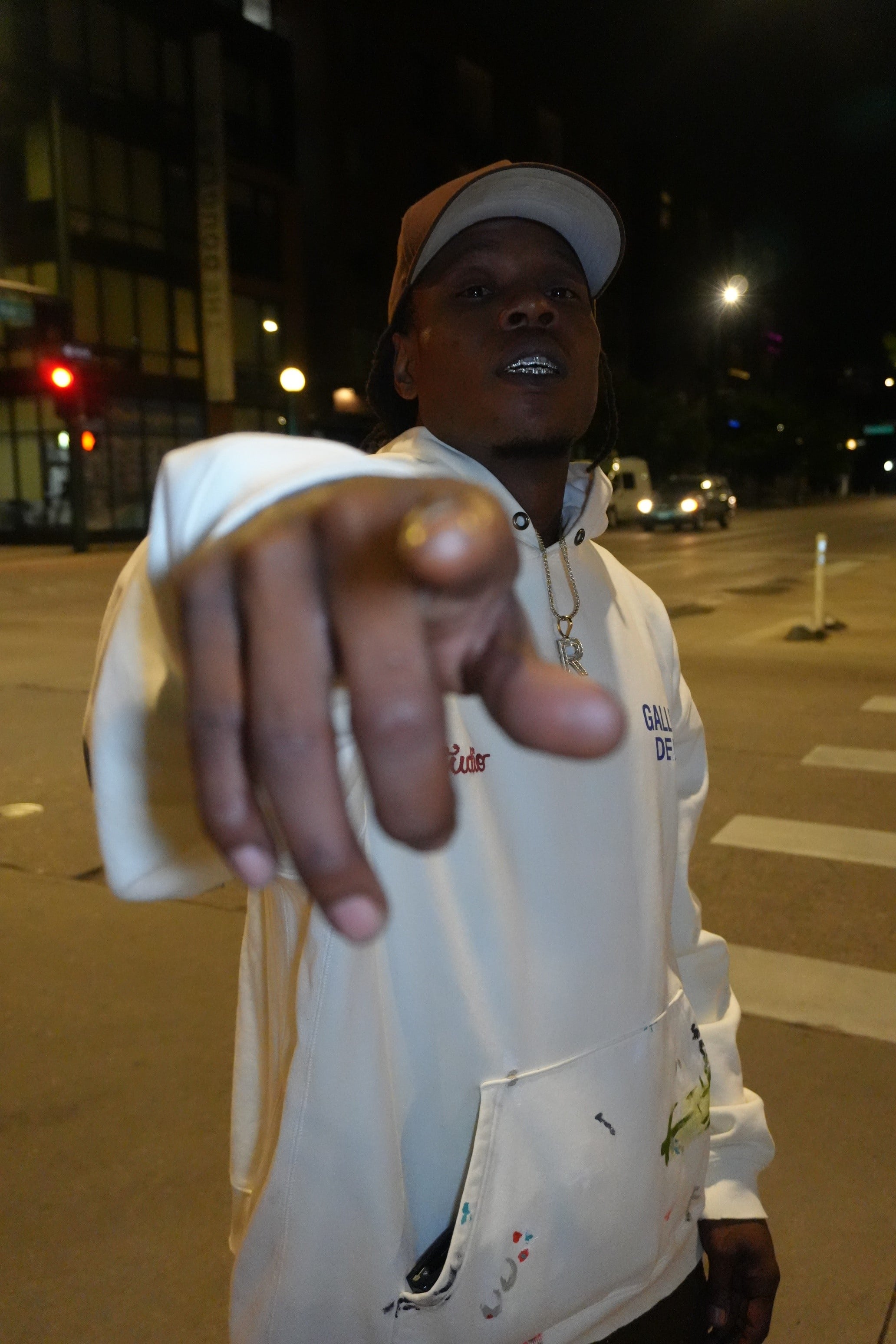 Ray Reed, night street, pointing